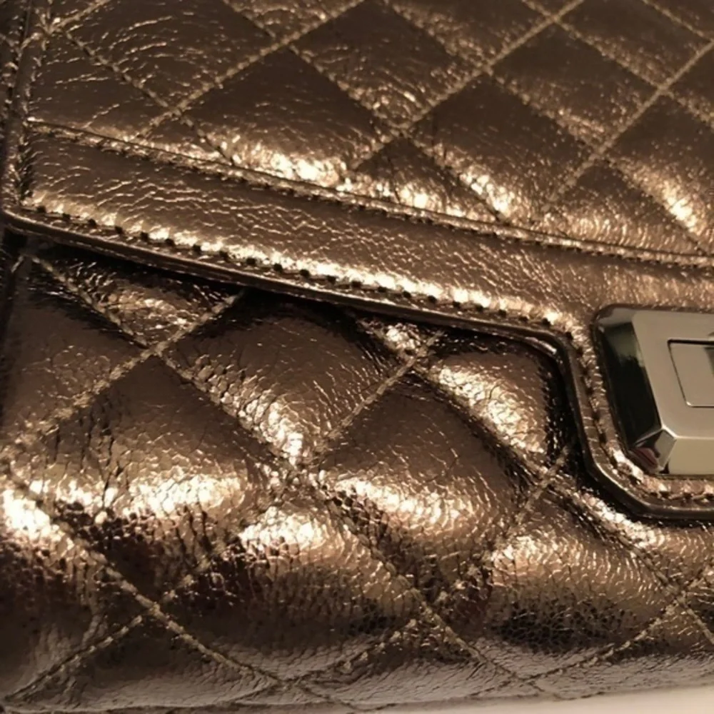 Michael kors metallic bronze quilted bag
